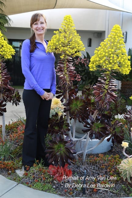 Fitness coach Amy VanLiew with aeoniums in bloom