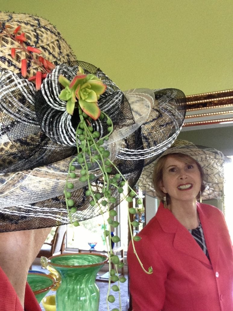 Succulent-decorated hats and art-to-wear