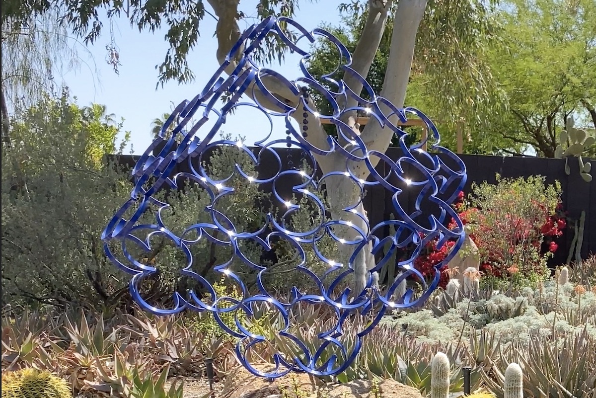 Blue wrought iron cube in Janet Orr's garden (c) Debra Lee Baldwin