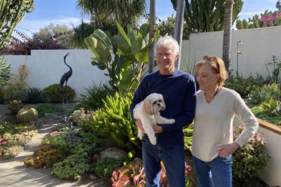 Melanie and Bob Buck in their garden, La Costa CA