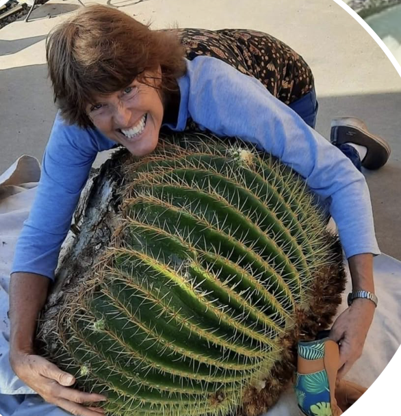 Jodi hugging barrel cactus