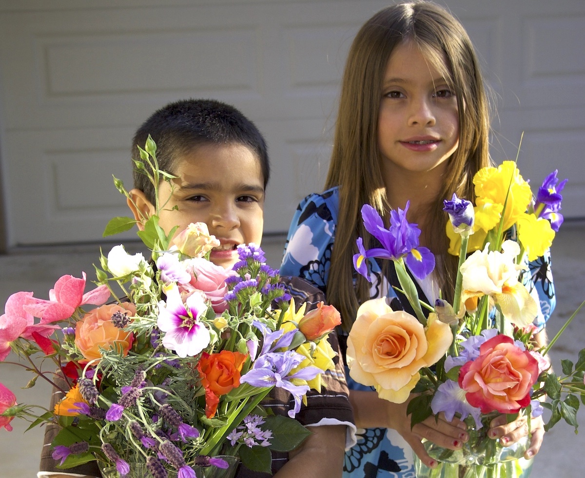 Kids with spring flowers (c) Debra Lee Baldwin 