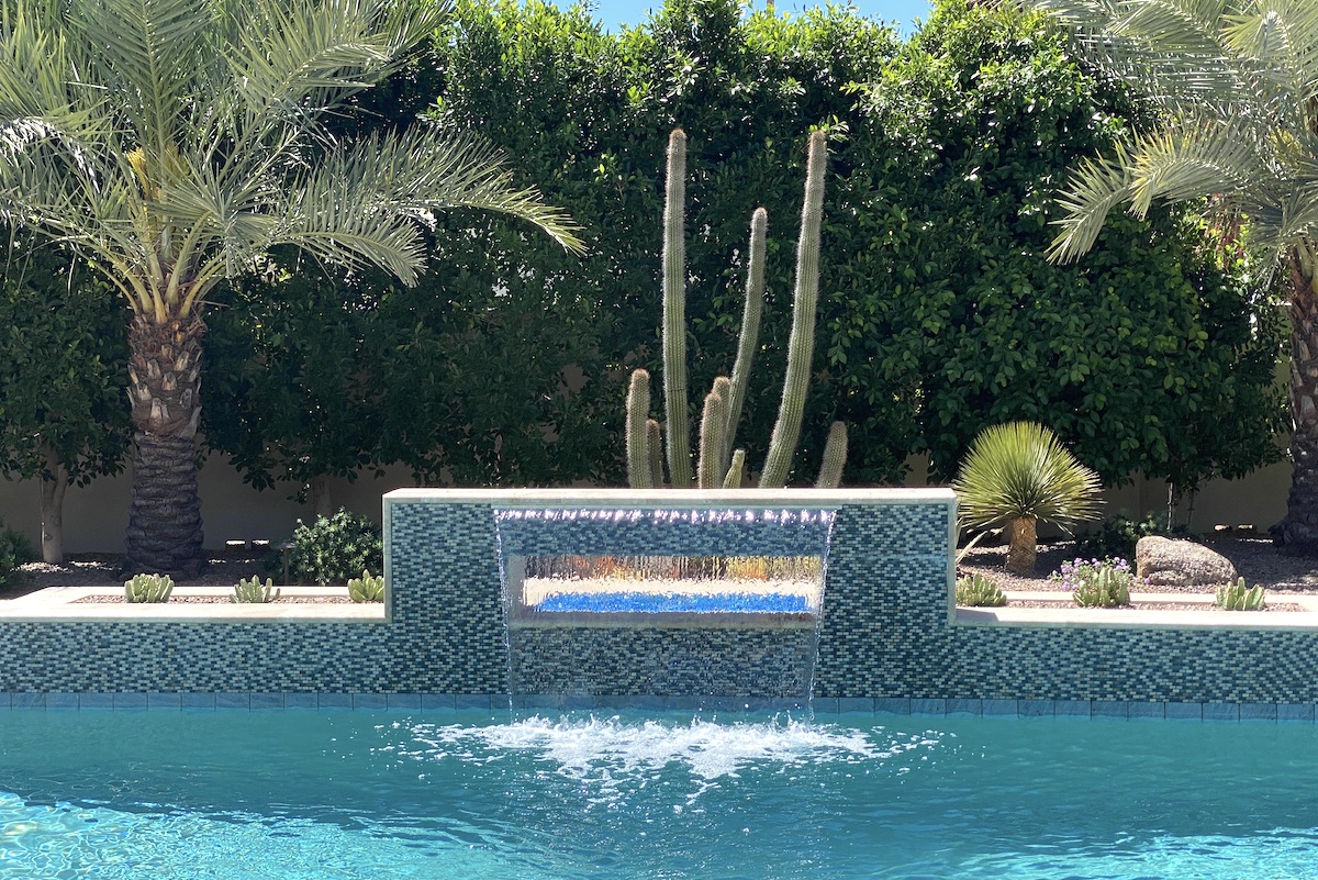 Turquoise pool with waterfall in Phoenix (c) Debra Lee Baldwin 
